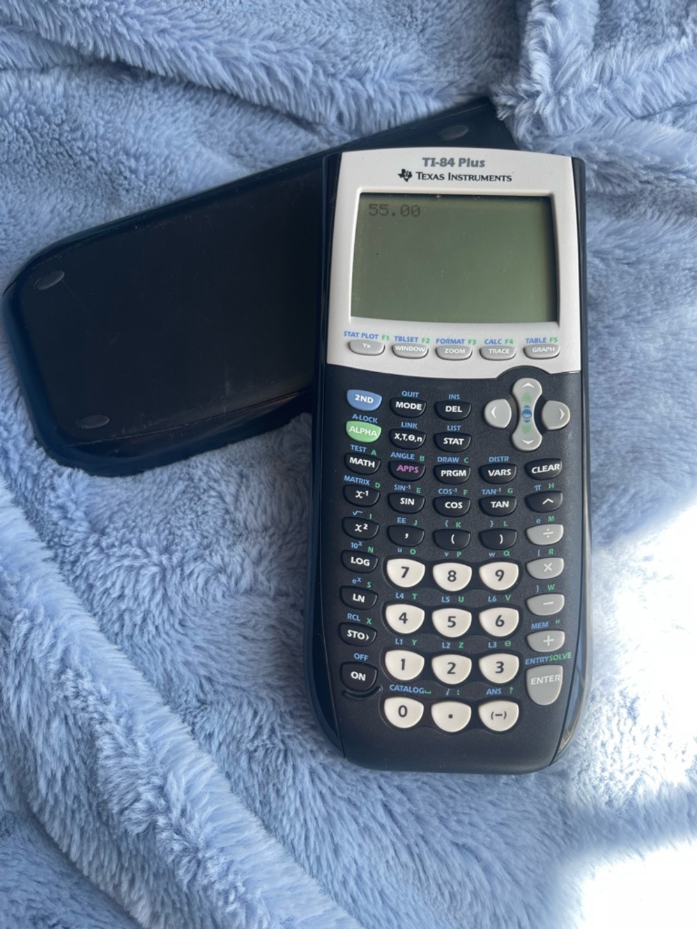 Texas Instruments TI-84 Plus Graphing Calculator in Black and White